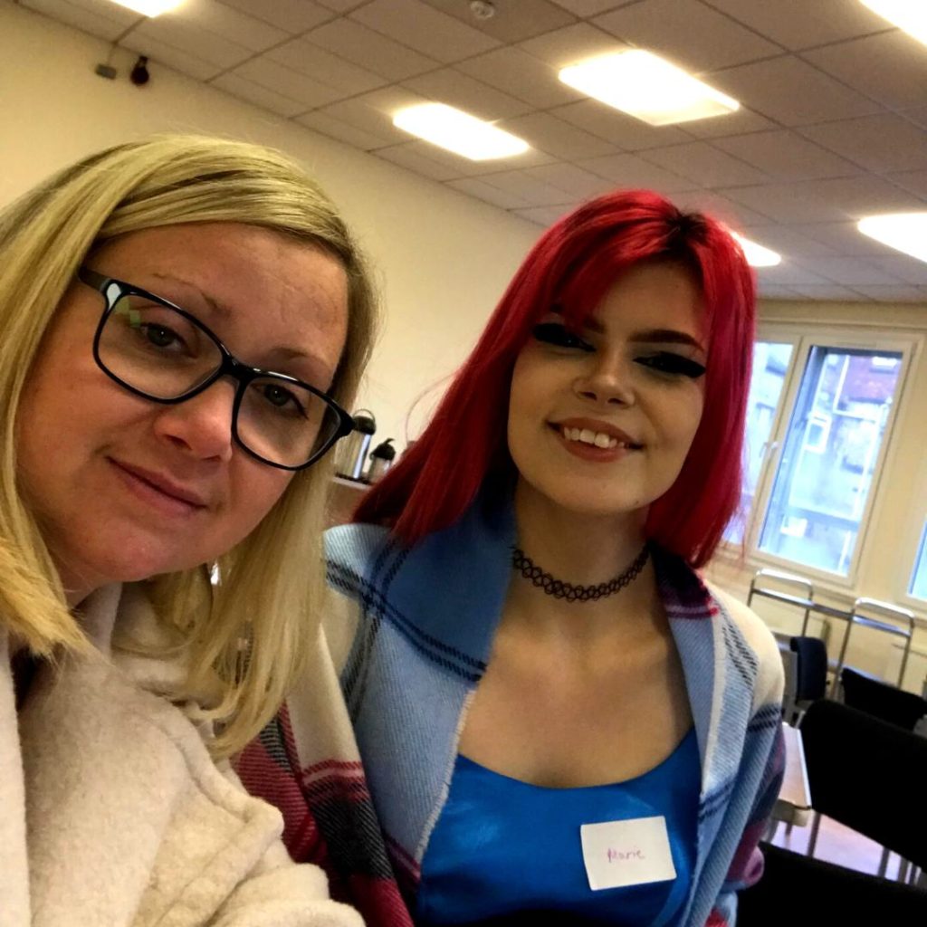 Marie and Hayley smiling at the camera at the care leavers event in Glasgow