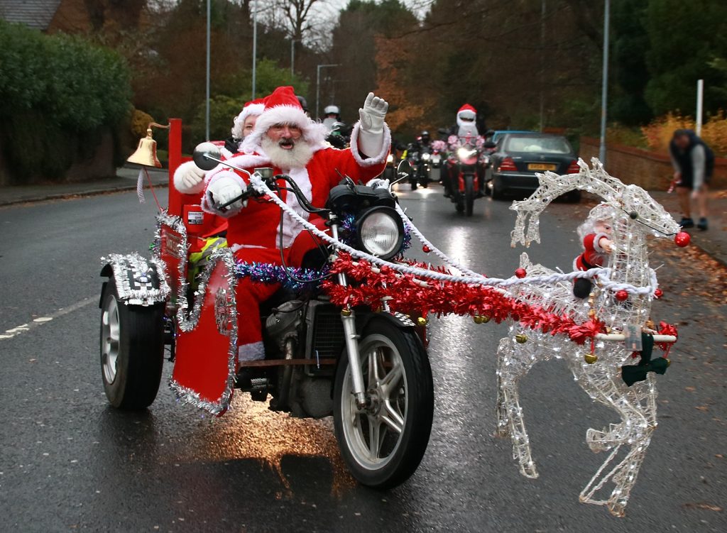 a biker dressed as Father Christmas
