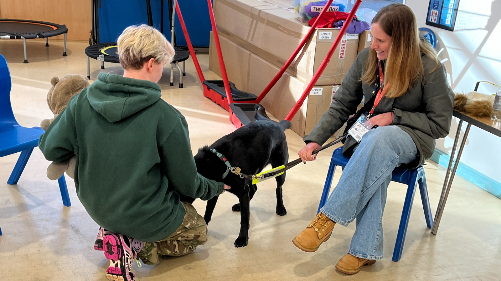 Lucy and her guide dog Jenny pay a visit to students at Inscape House School to raise awareness