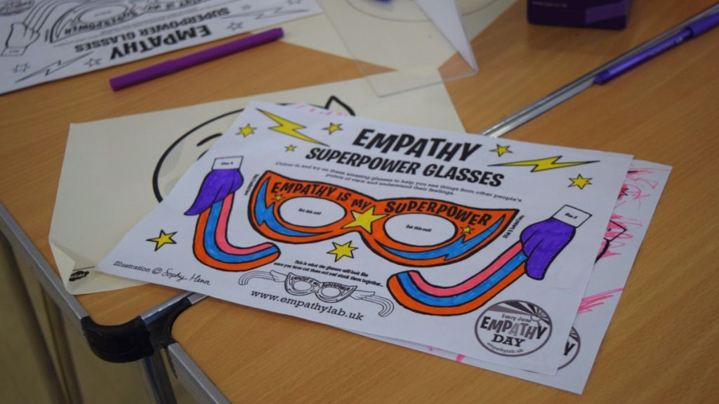 A colouring sheet with empathy superpower glasses.