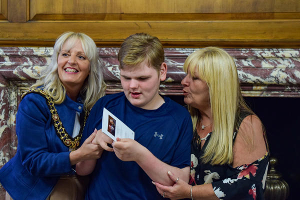Lord Mayor Councillor Donna Ludford, a young person and their parent