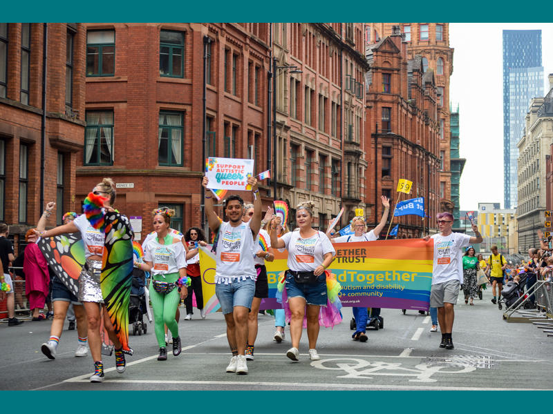 Together Trust staff marching in the parade