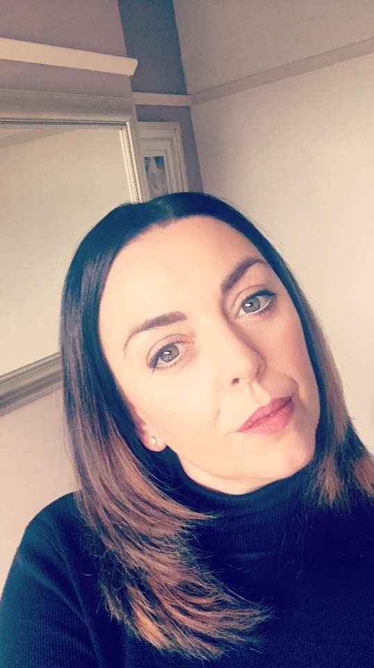 headshot image of Tracey