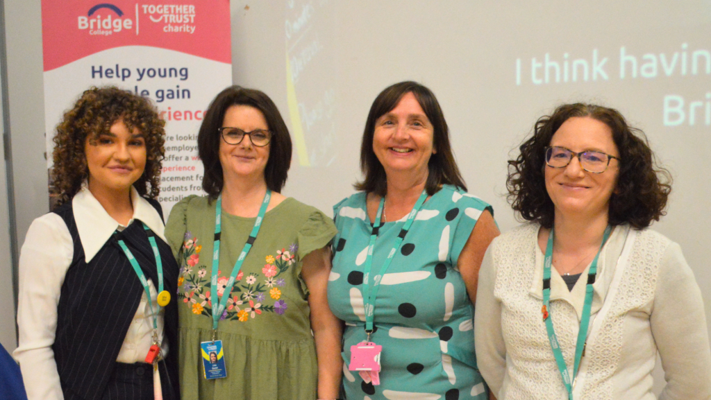A photograph of the four women who are the Bridge College work experience team looking at the camera.